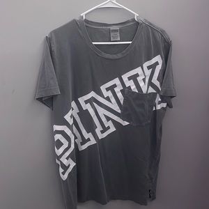 Pink shirt size large could also fit an XL.